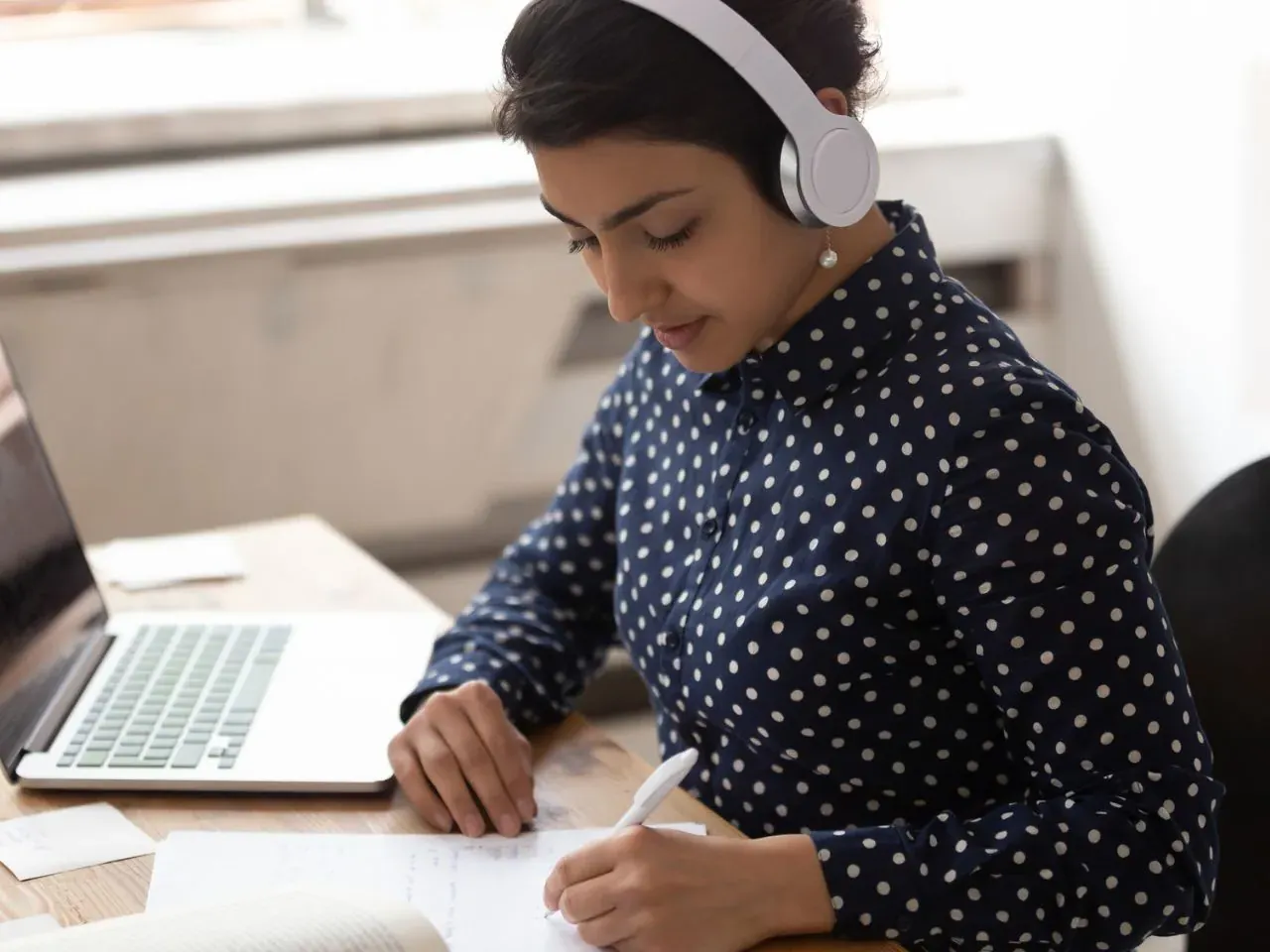 woman working with headphones on